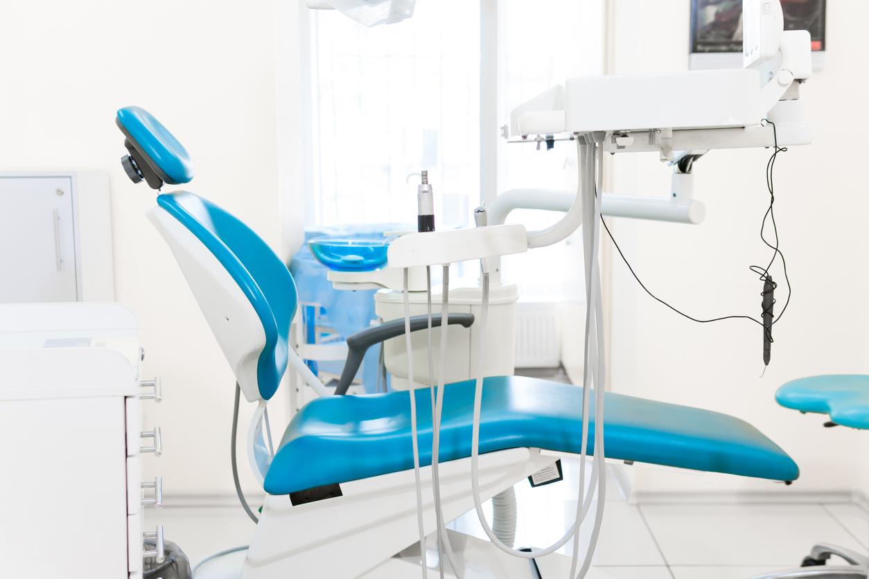 Dentist workspace with modern chair, equipment and instruments. Technologies in stomatology. Dental care and oral hygiene concept
